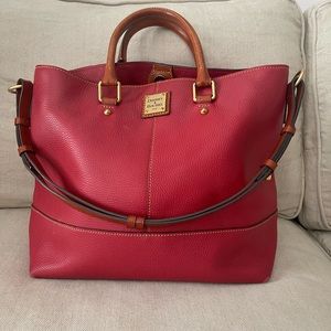 Red pebble grain leather Trudy satchel from Dooney & Bourke.